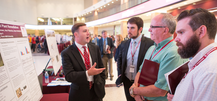 Delegates from industry interacting with faculty