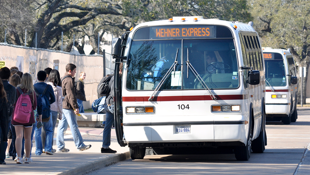 Students getting in to Aggie Bus.