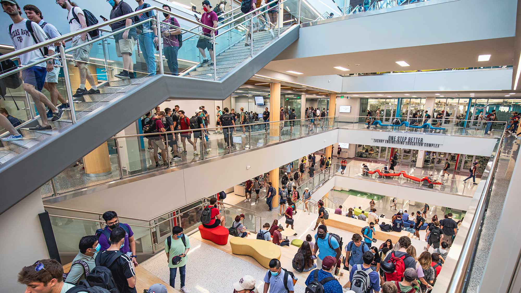 TAMU students walking on the Learning Stairs inside the Zachry Engineering Education Complex.