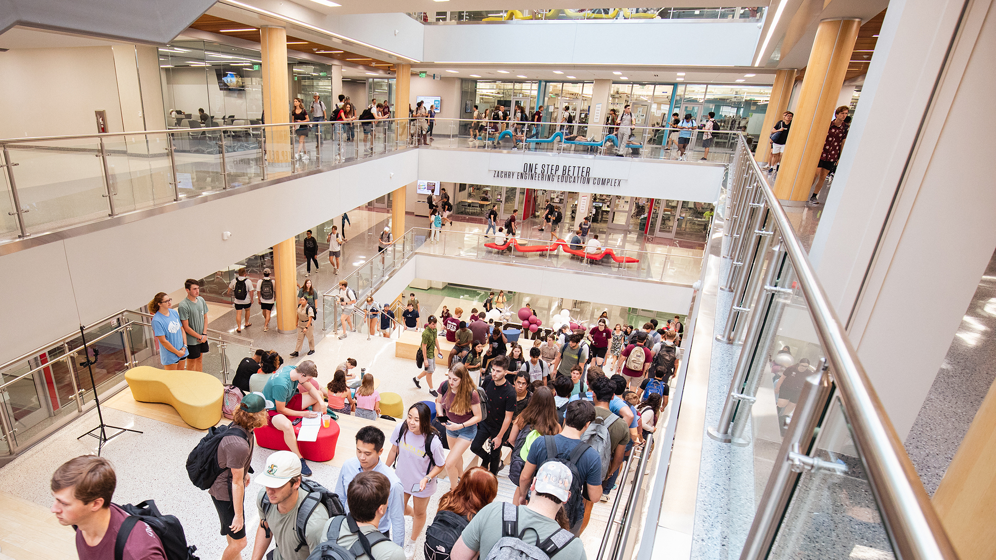 TAMU students walking on the Learning Stairs inside the Zachry Engineering Education Complex.