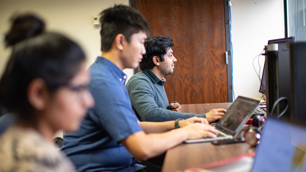 Image of students in a computer lab.