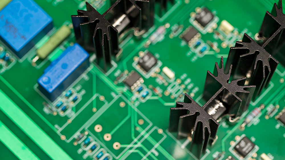 A close-up of tiny circuitry board components.