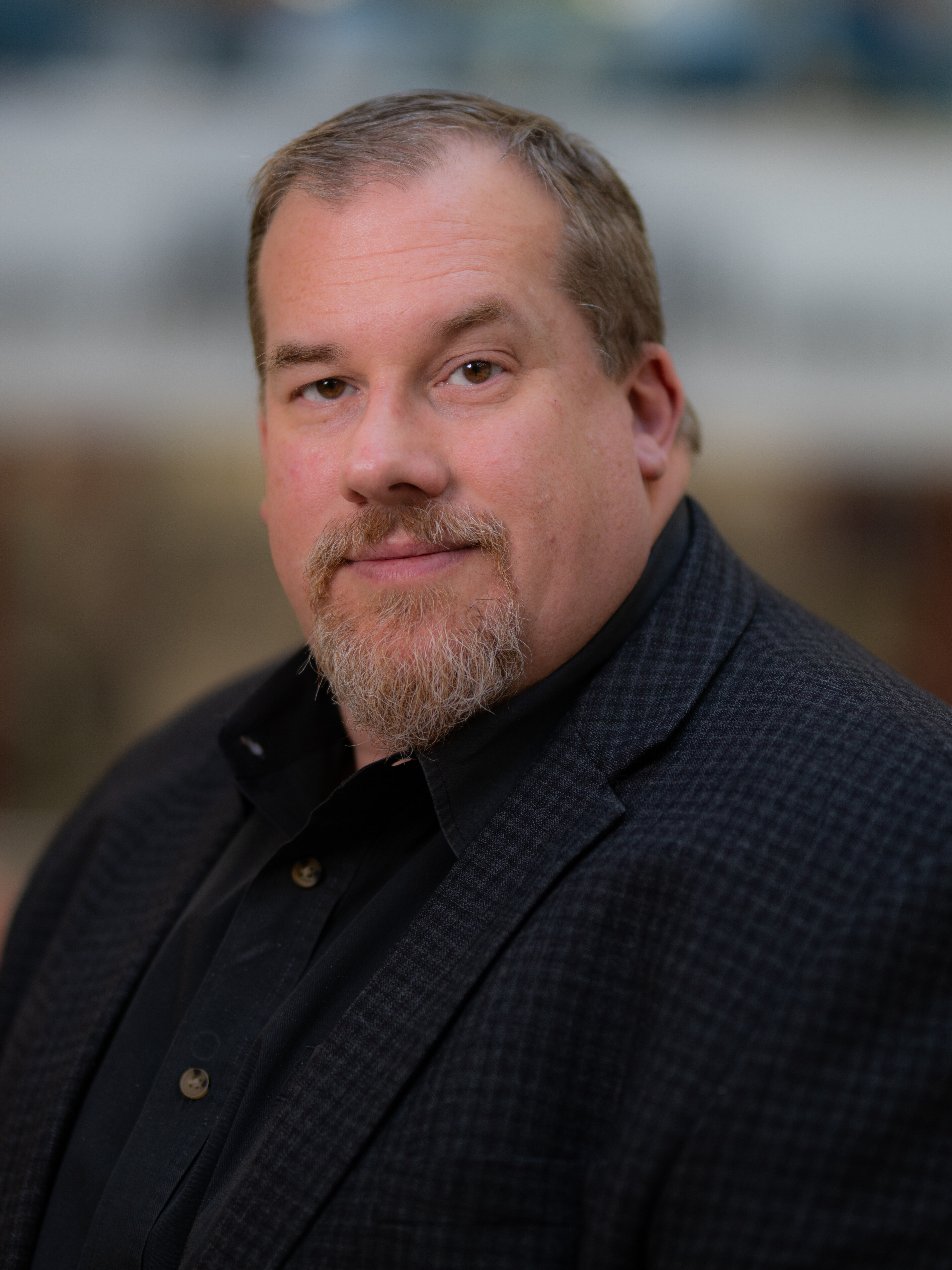 Headshot of John Lusher