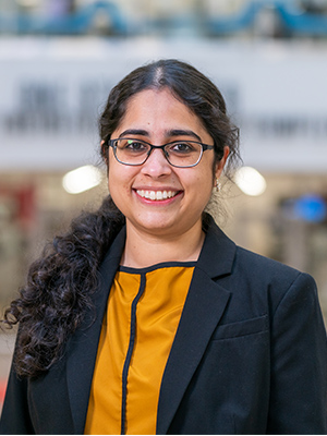 Headshot of Arya Menon.