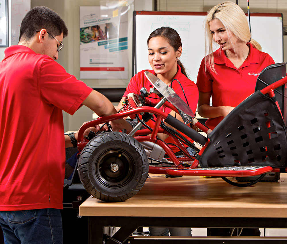 Students building a motor vehicle.