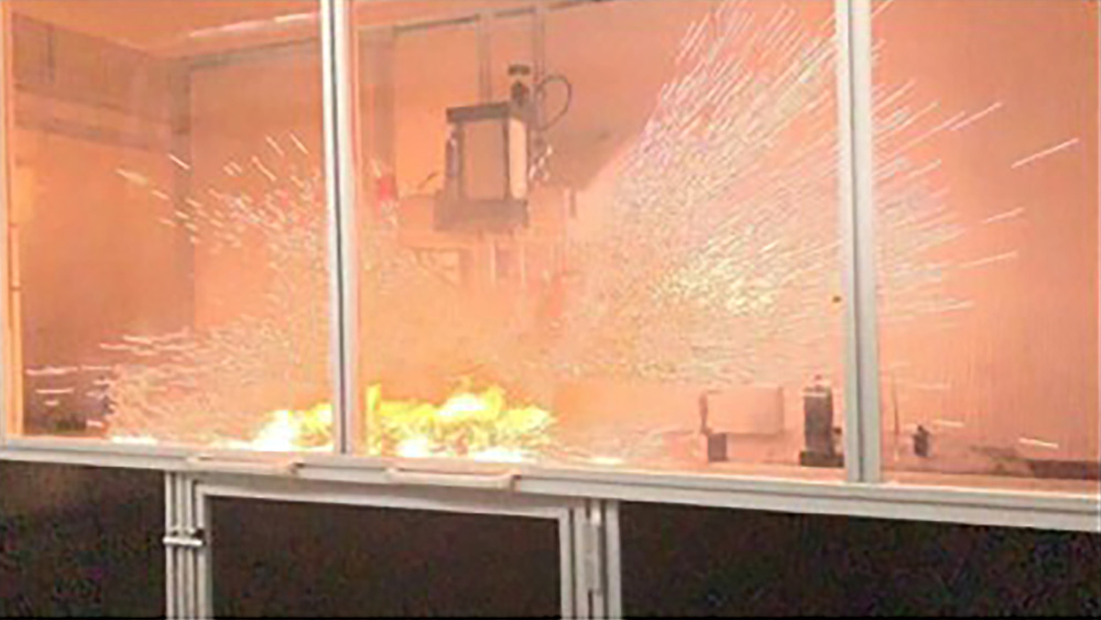 Sparks flying being a window in a lab.