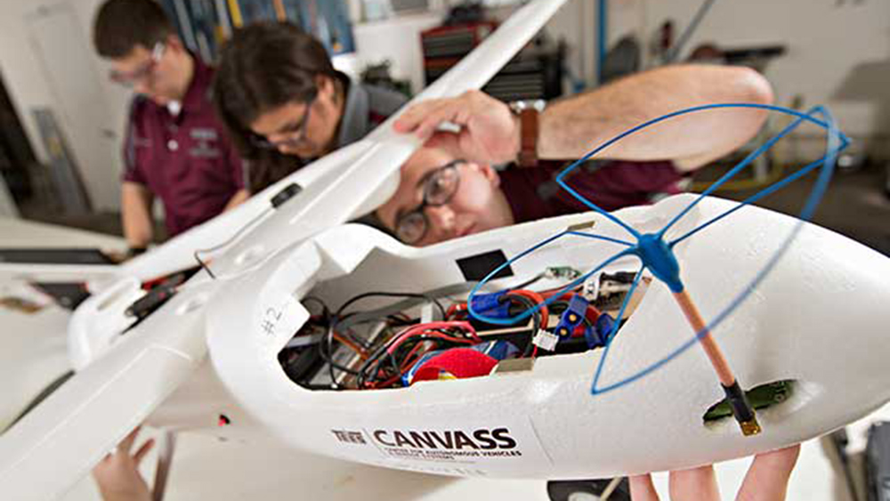 Student researchers in the CANVASS lab. 