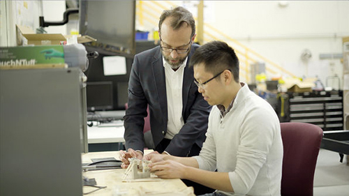 Dr. David Staack and his student in the lab