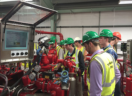 2016 Texas A&M University petroleum study abroad class explores Halliburton cementing lab with simulator