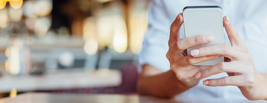 woman holding phone