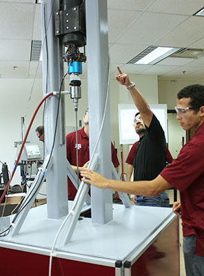 2017 Aggie Drillbotics team with judge 2