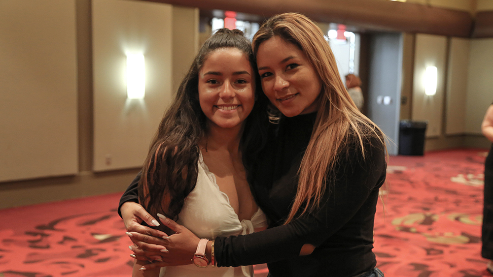 Mother and daughter embrace