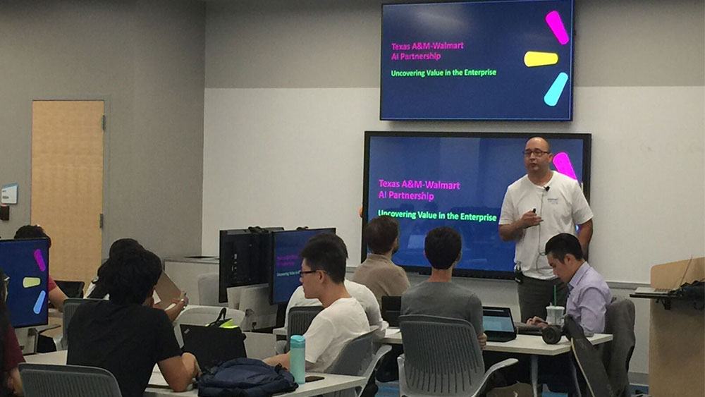 Carlos Riojas, Walmart senior director of software engineering and artificial intelligence, visits artificial intelligence course at Texas A&M University.