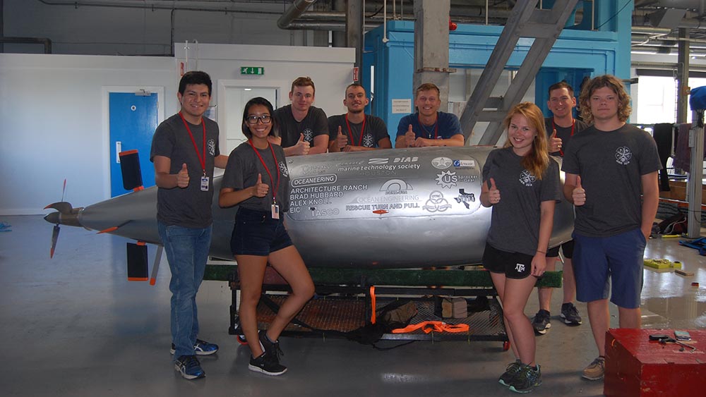 The Human-Powered Submarine Team gathers in front of Hullabalooga.