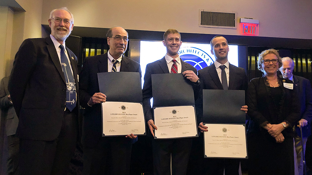 Kevin Berto stands with his advisor Dr. Falzarano and other co-authors, along with Suzanne Beckstoffer, SNAME president.