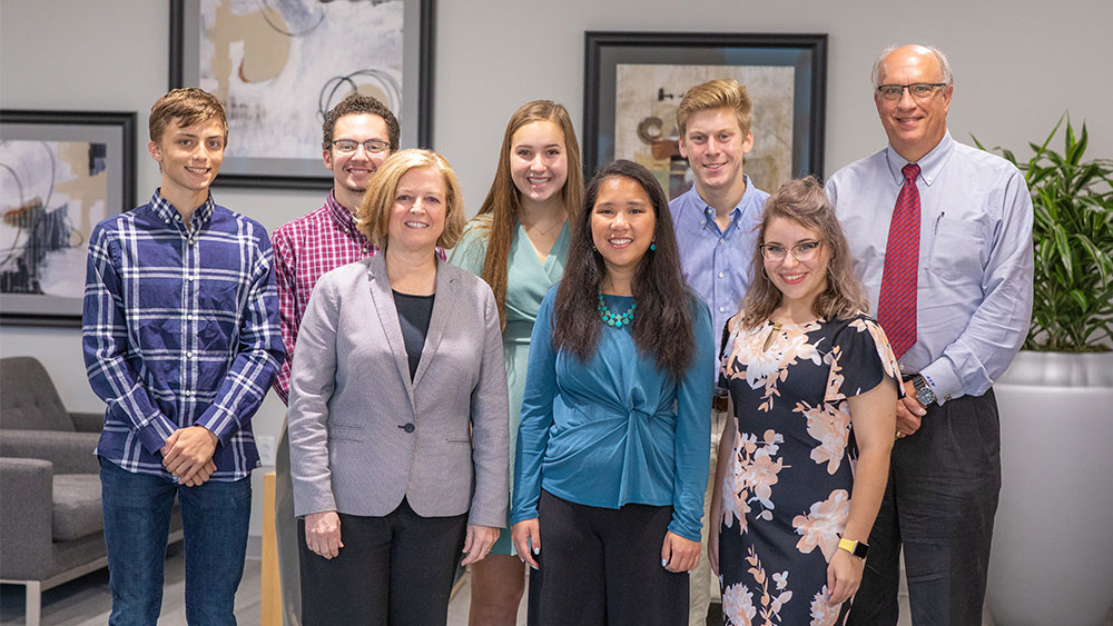 M. Katherine Banks and Dr. Mark Weichold with this year's recipients of the Dean's Scholars Award.