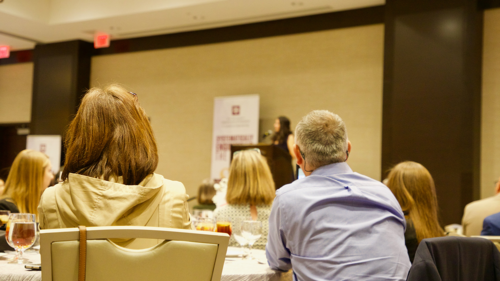 Audience listening to Maria Cabrera Lehmann's speech. 