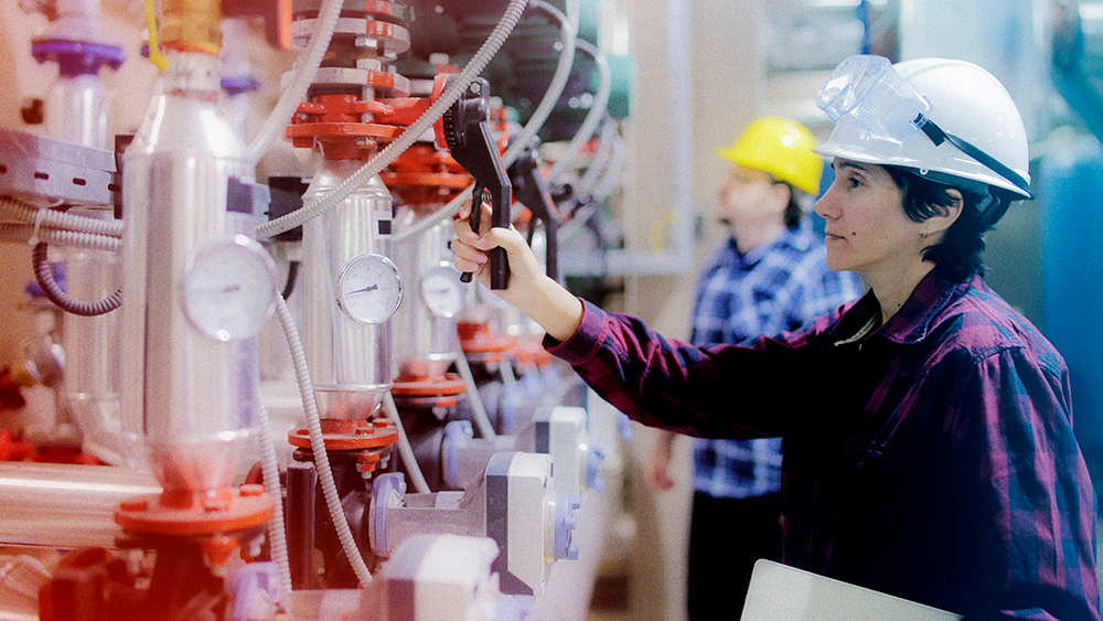 Woman working in plant