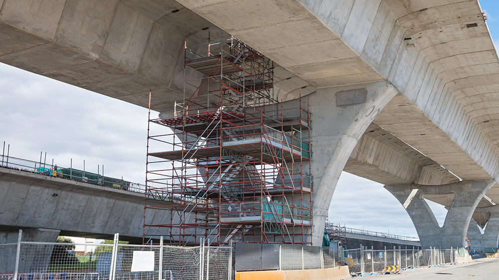 Bridge with a scaffolding underneath for repairs. 