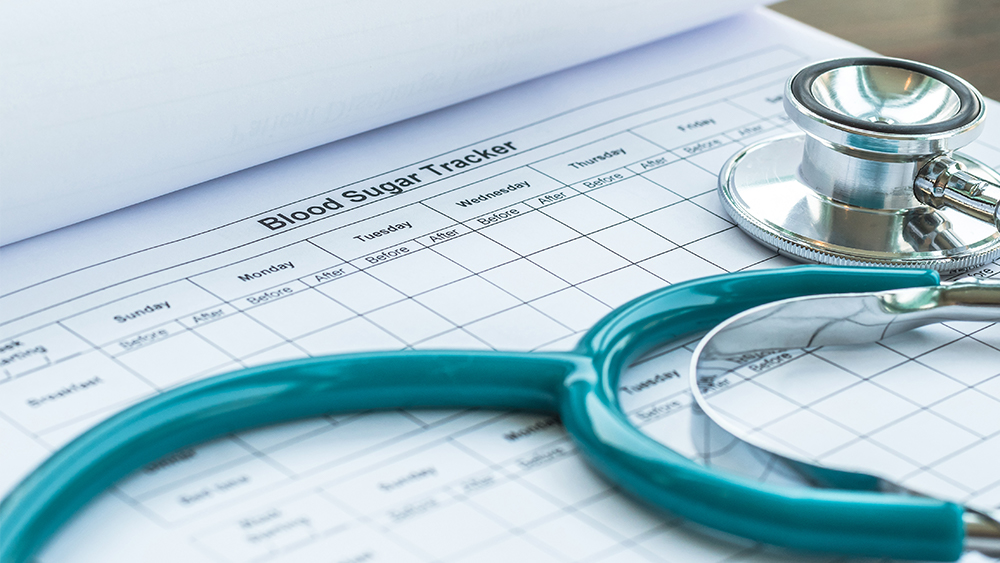 Stethoscope on a chart for monitoring blood sugar