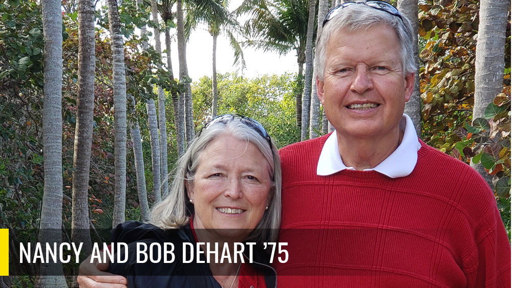 Nancy and Bob Dehart taking a photo outside. 