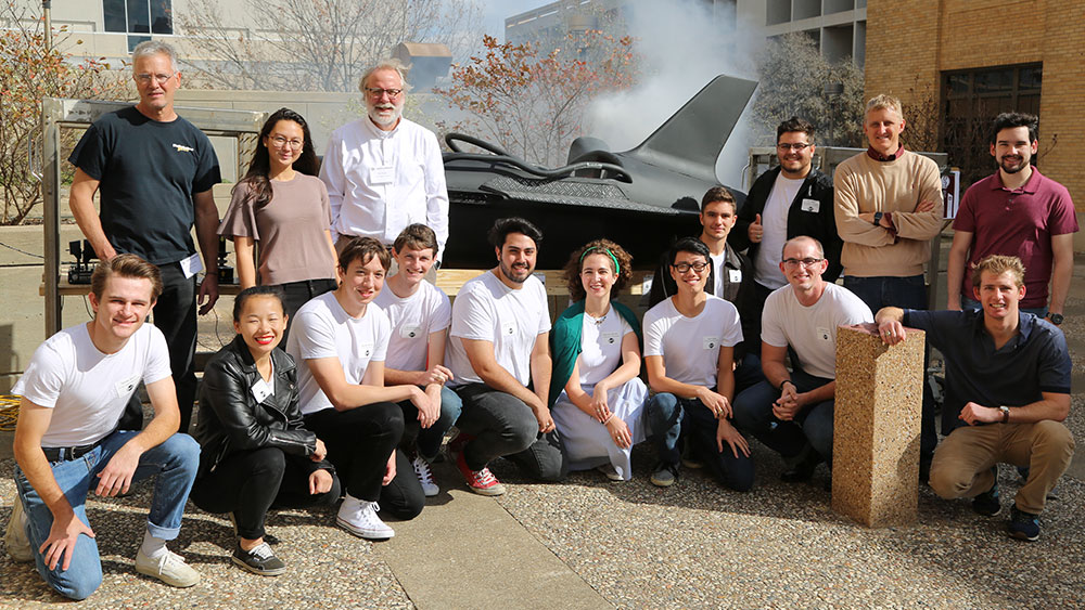 Group photo of Team Retro Rocket with their faculty advisors and rocket car donor.