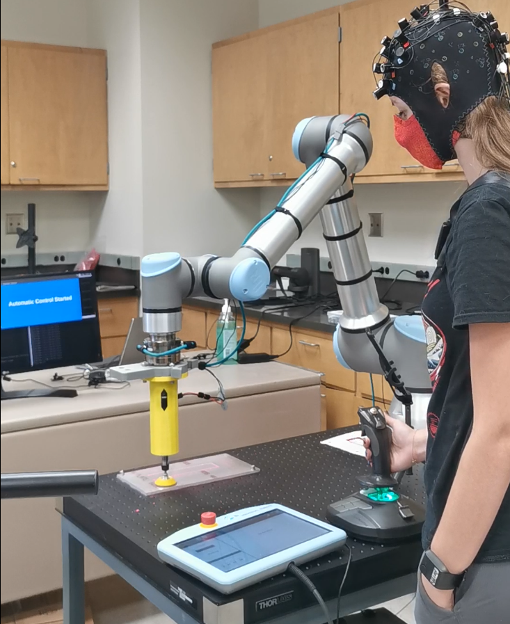 Doctoral student Sarah Hopko working with a gear system