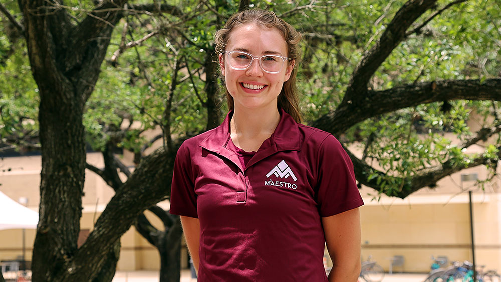 Doctoral student Collette Gillaspie smiling for a photo outside.