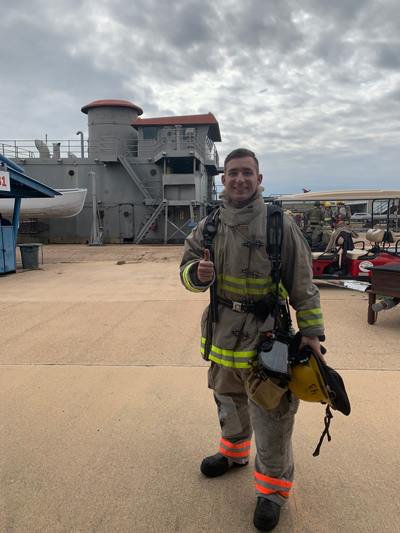 Anthony Roman in firefighter uniform 