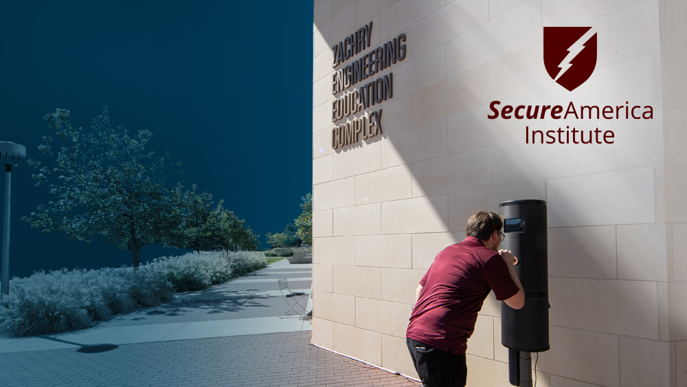 Man using Worlds Inc. breathalyzer in front of the Zachry Engineering Education Complex