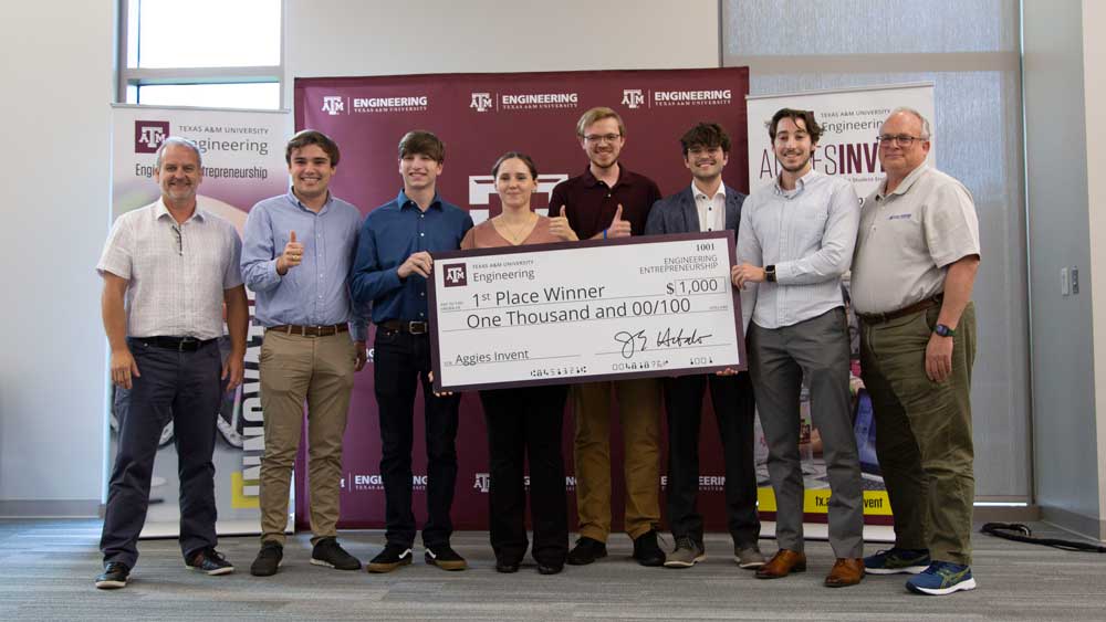 First place team Degenerators poses with judges at Aggies Invent.