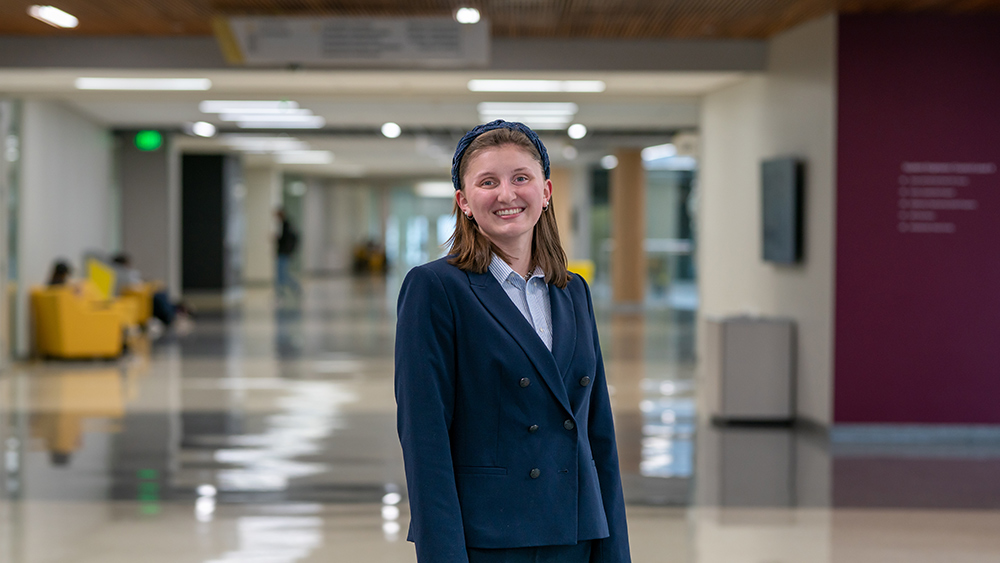 Alt Text: Emilia Mrugala poses for the camera in the ZACH Engineering Building on Feb. 2.