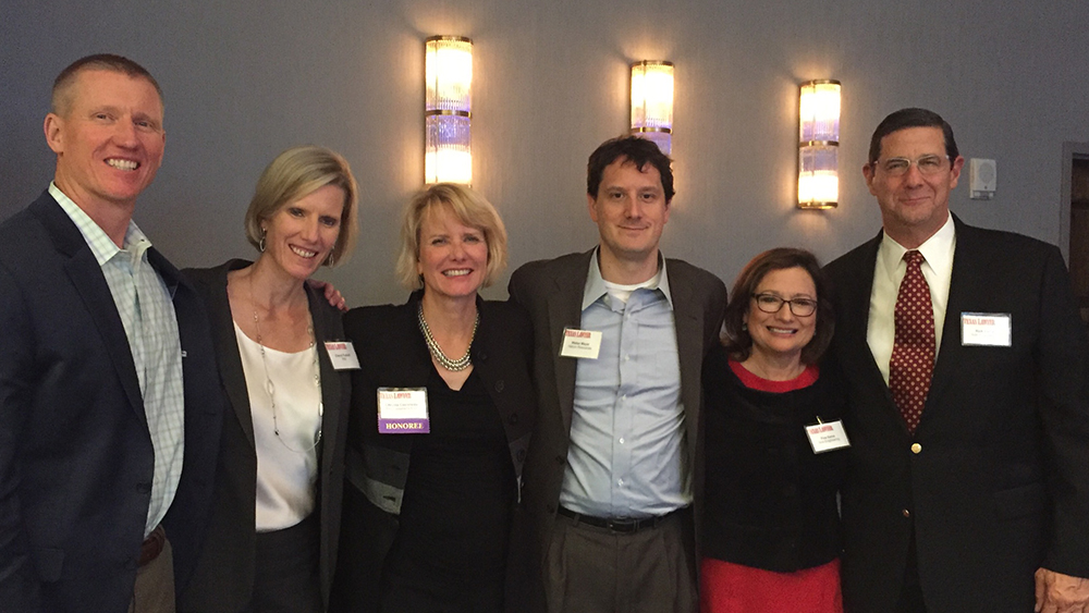 Chrysta Castañeda and Ricardo Garza with friends and family at the 2017 Women in Energy Awards.