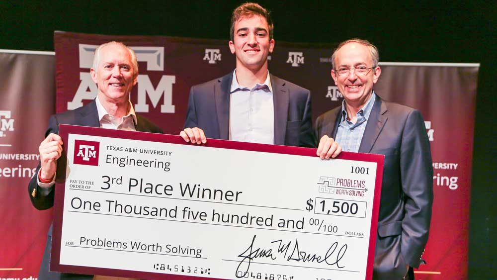 Jim Donnell, Lucas Graf and Chris Curran with a jumbo check for third-place.