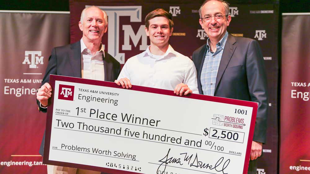 Jim Donnell, Eric Hall and Chris Curran with a jumbo check for first-place.