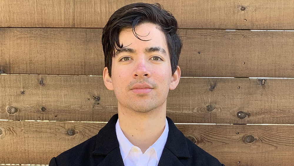 Ph.D. candidate Matthew Vaughan smiles for a photo.