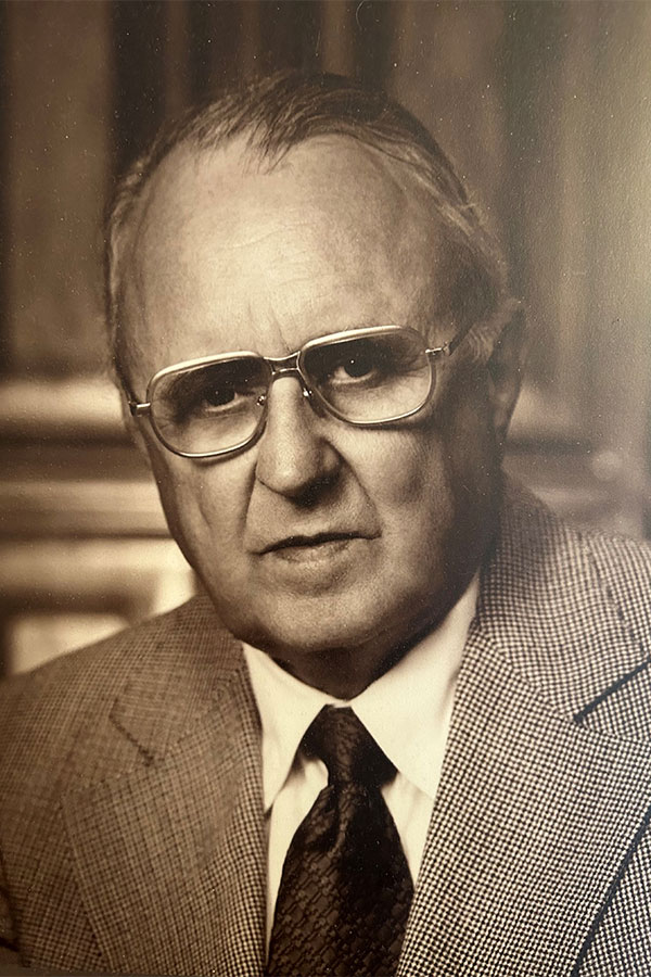 Distressed photo of a man's headshot 