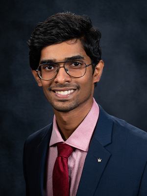 Headshot of Suraj Panicker.  