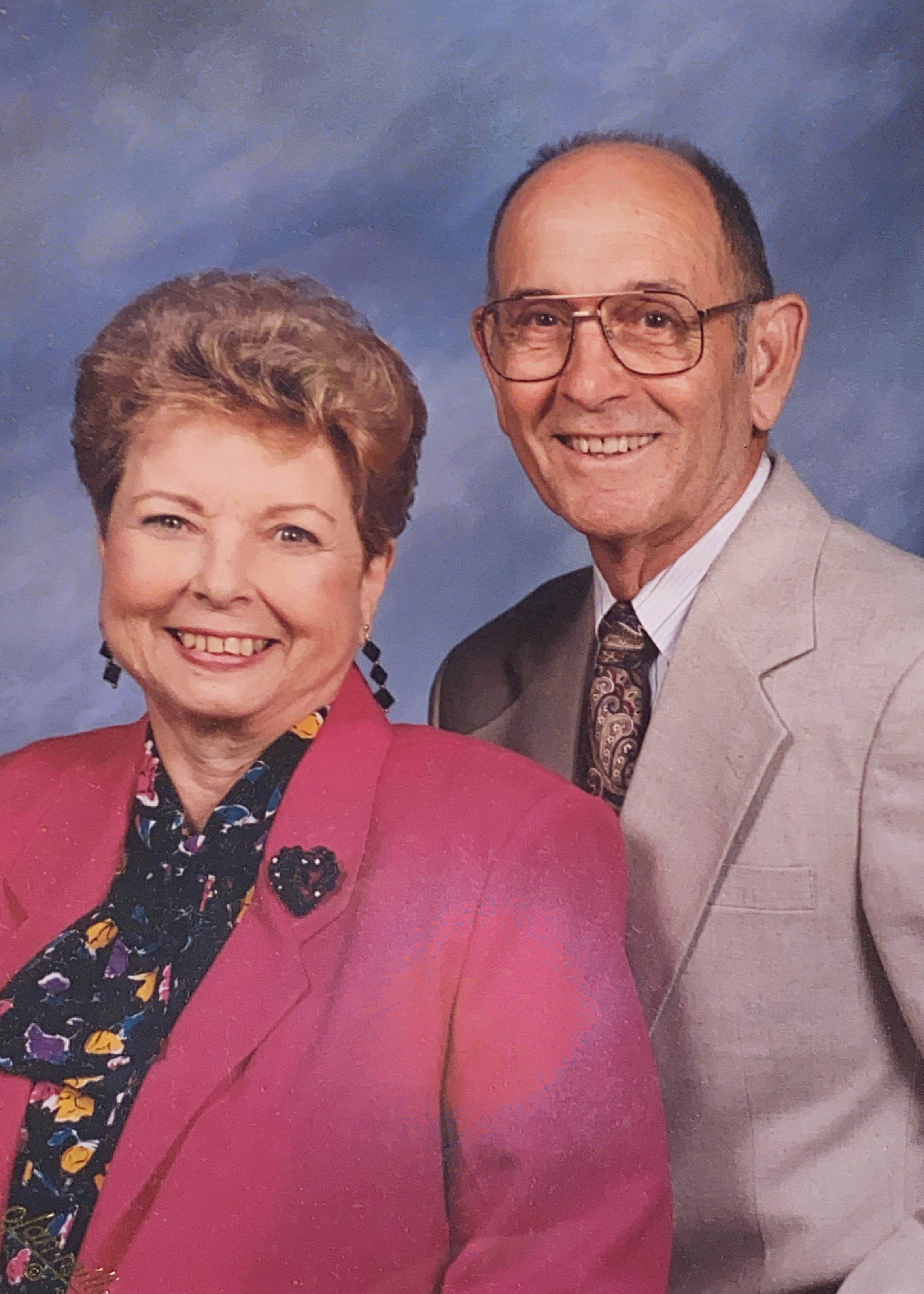 Betty J. and Earl R. Gordy ’50 posing for a photograph together.