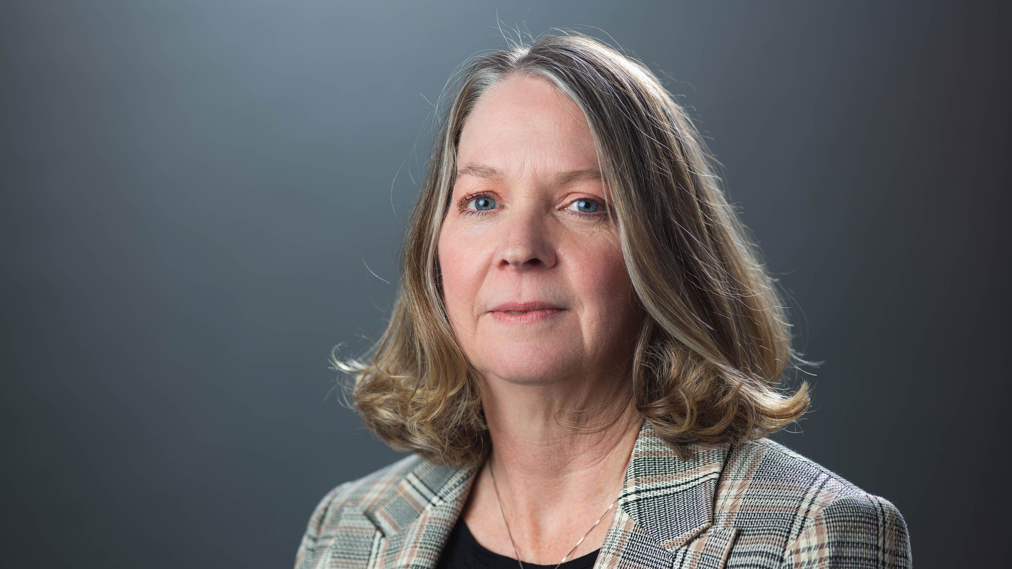 Headshot of Evelyn Mullen.