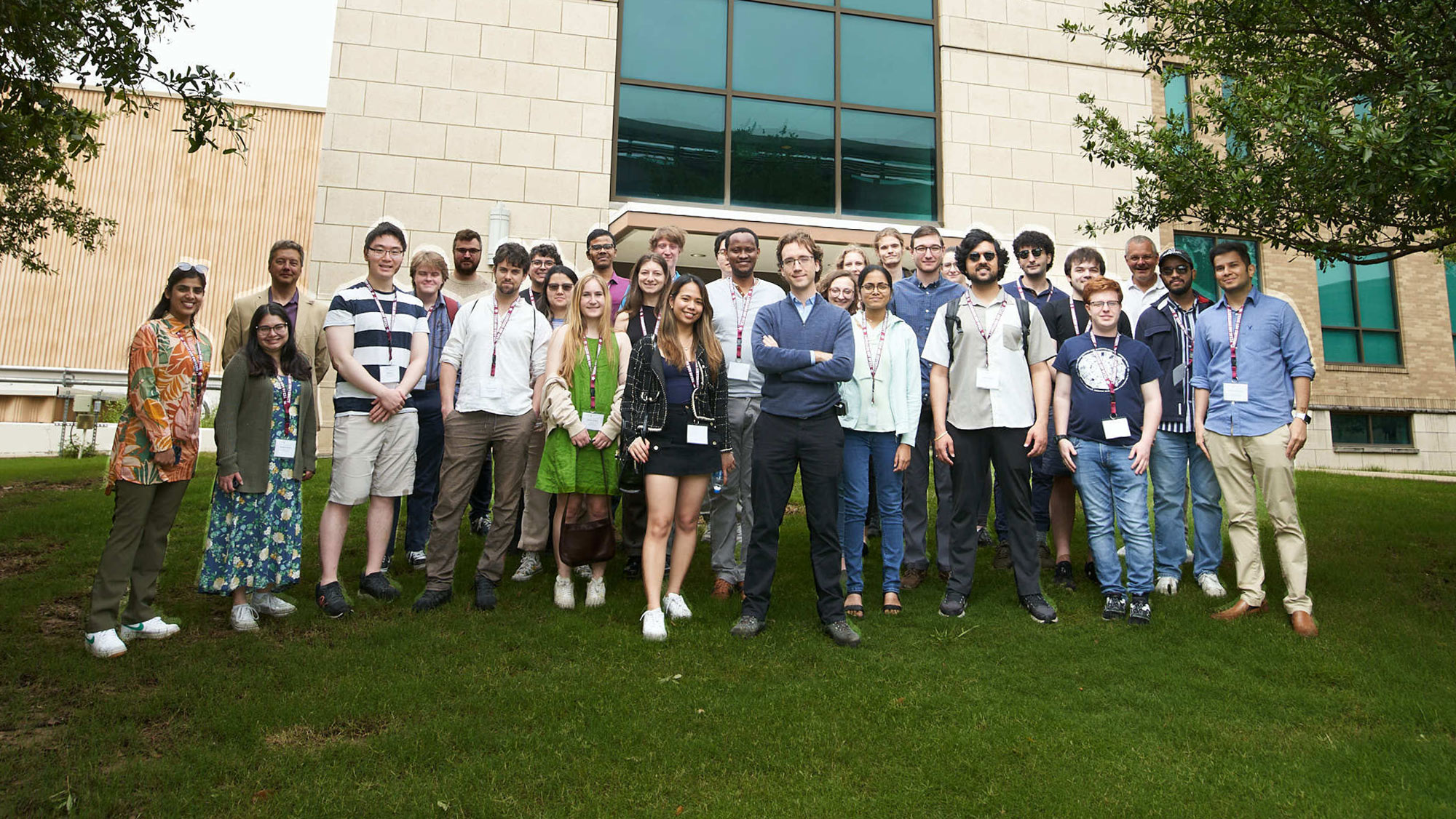 A group of students standing outside a building.