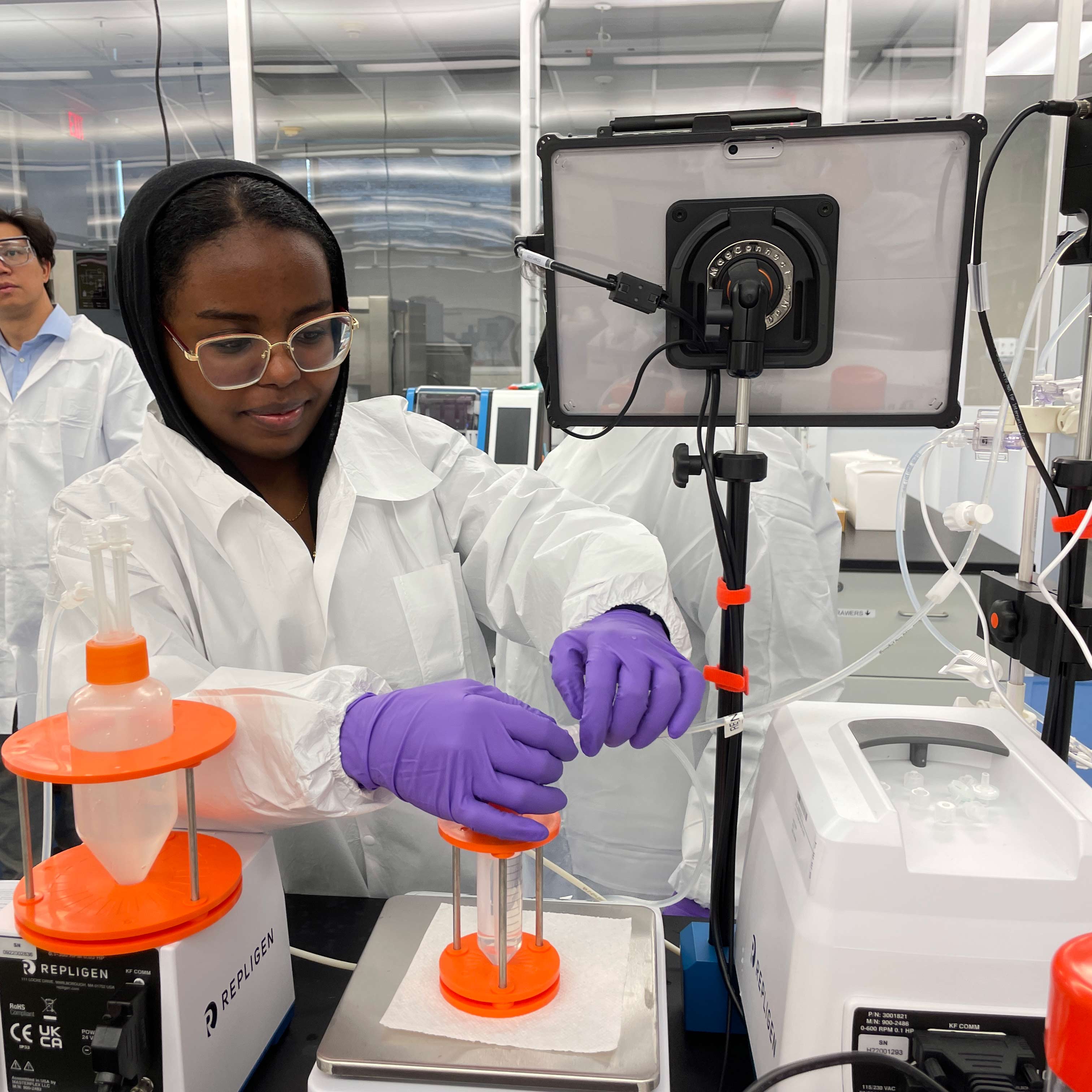 Student conducting research in a lab setting.