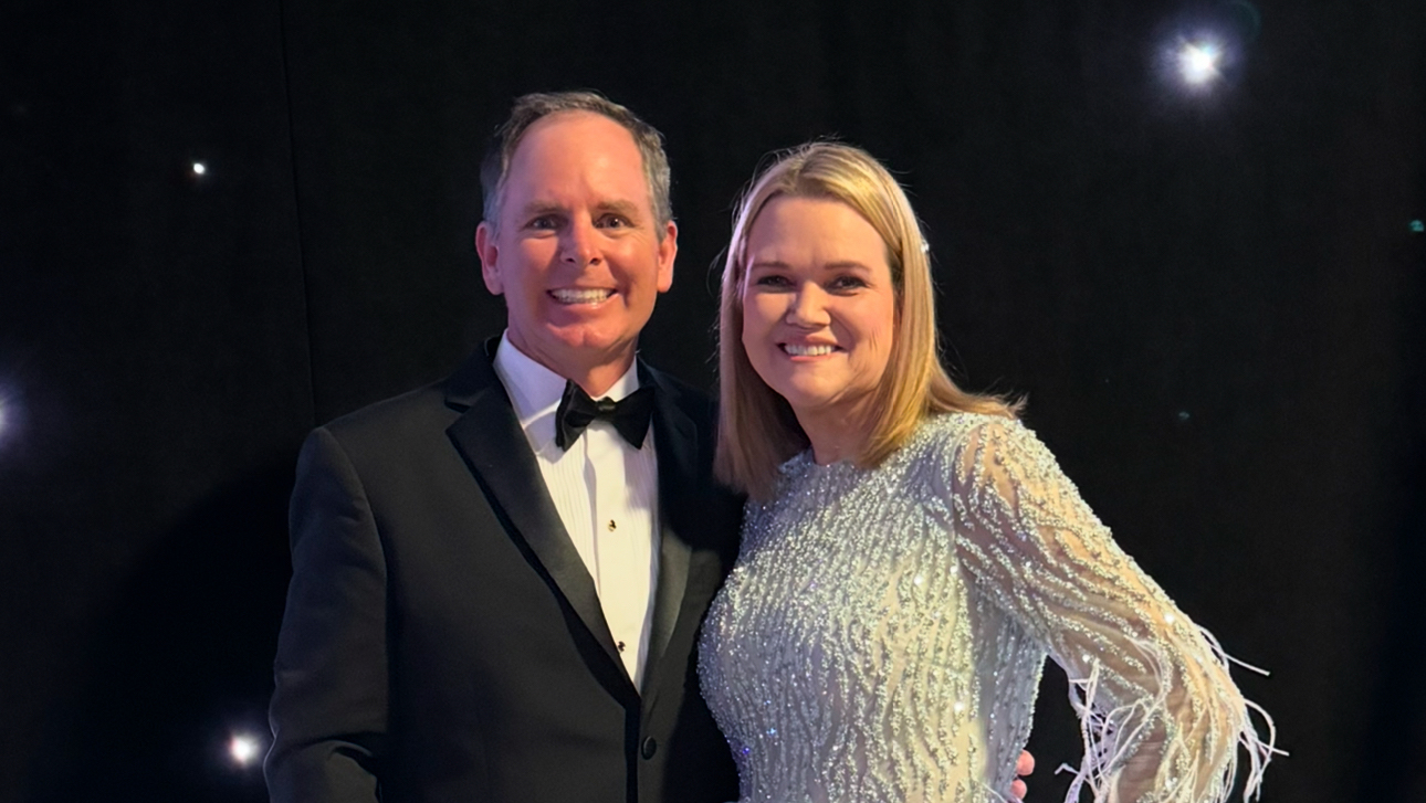 A couple in formal attire.