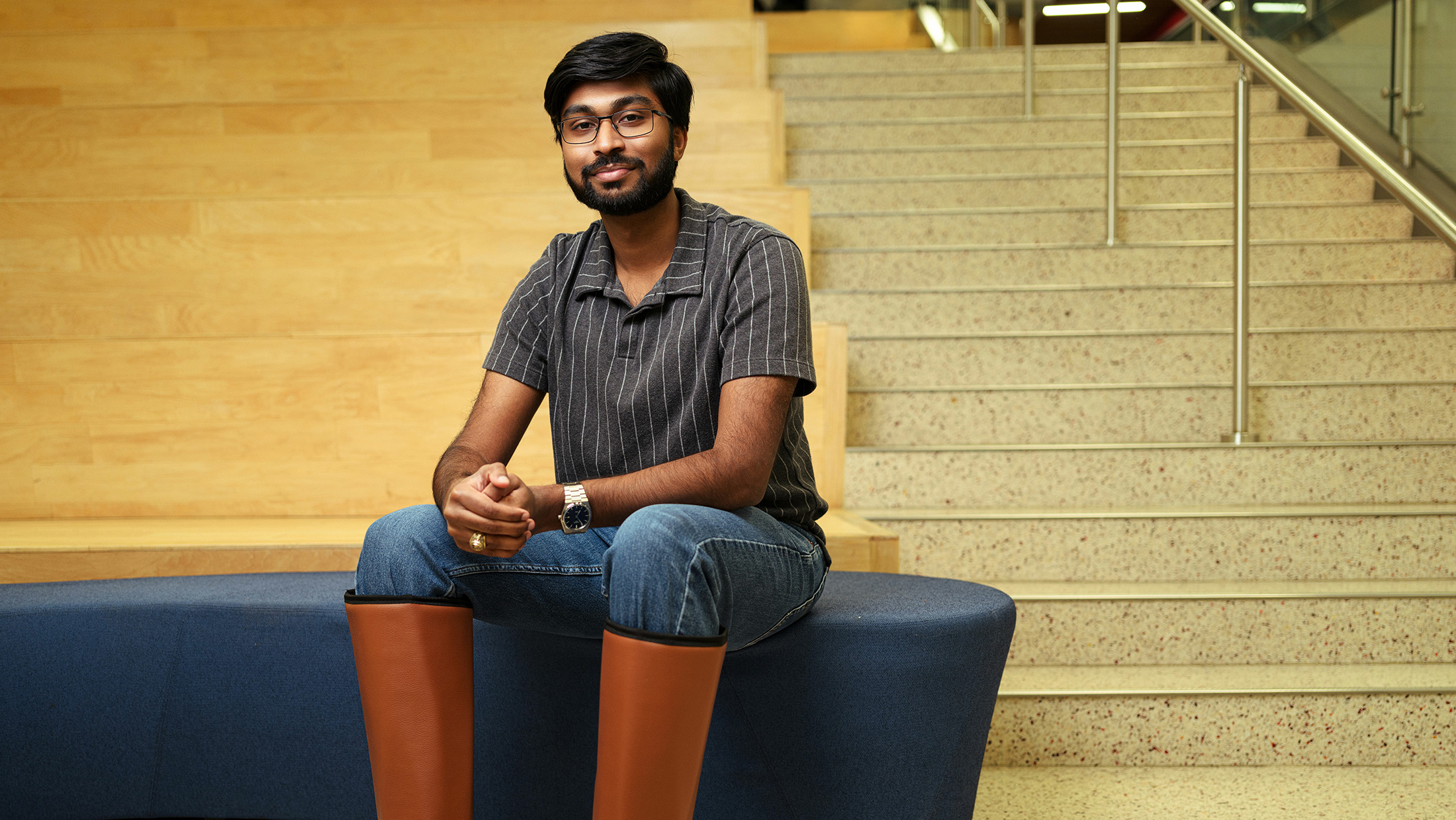 Man sitting on bench.