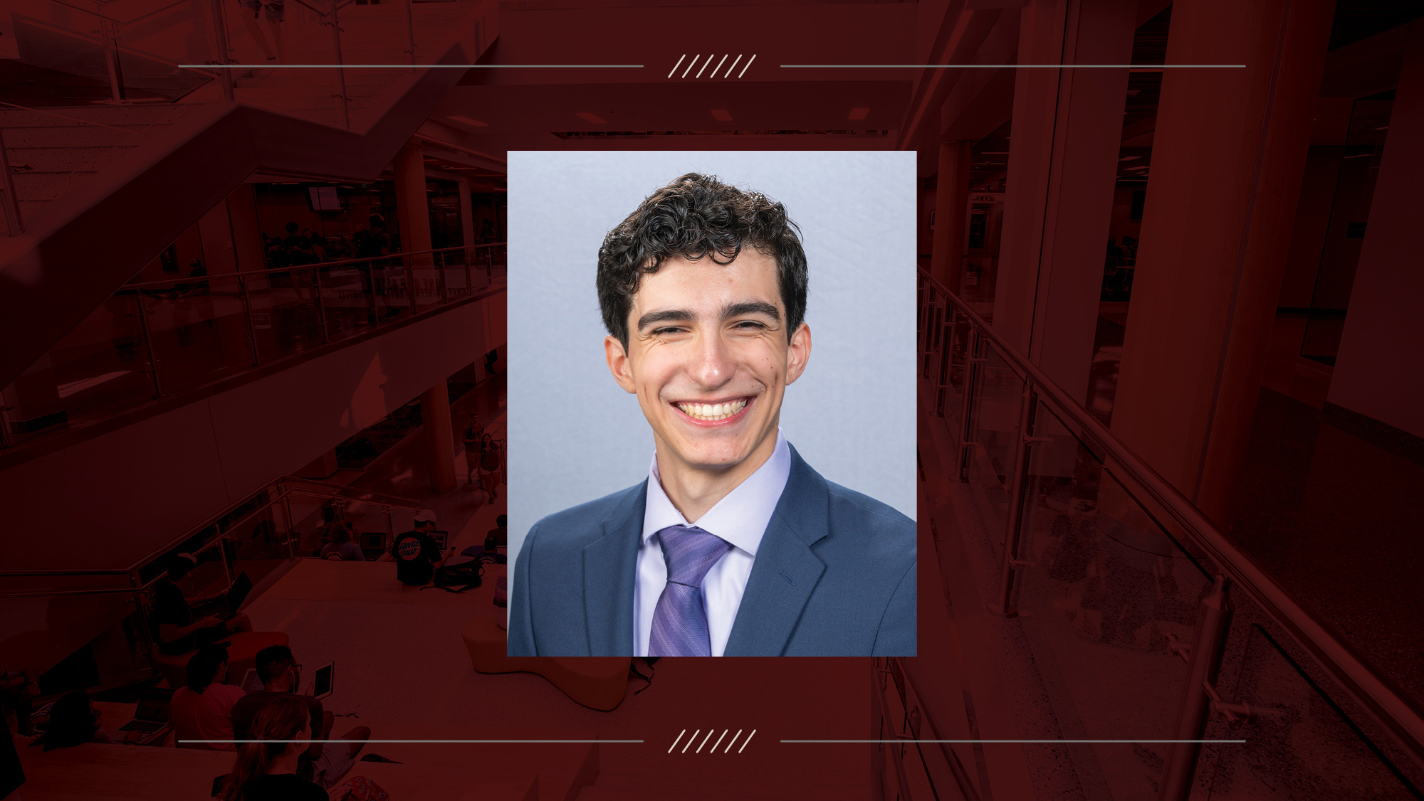 Headshot of Kyle Beishir on a maroon background.