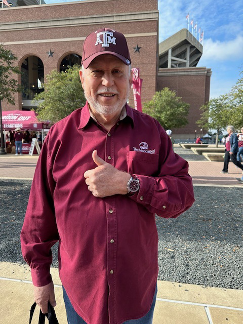 A man giving a thumbs up.