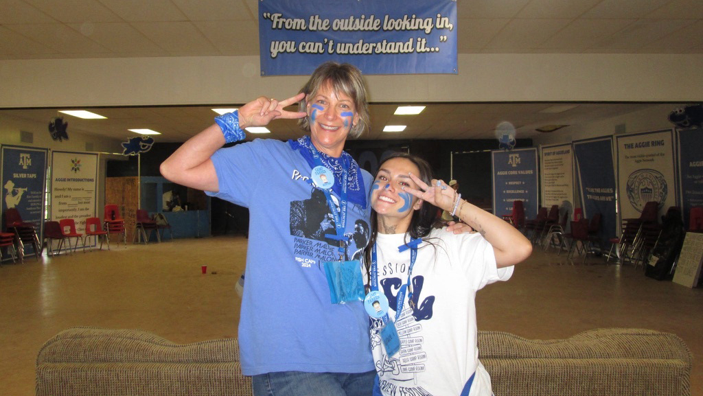 Two women posing for a picture.