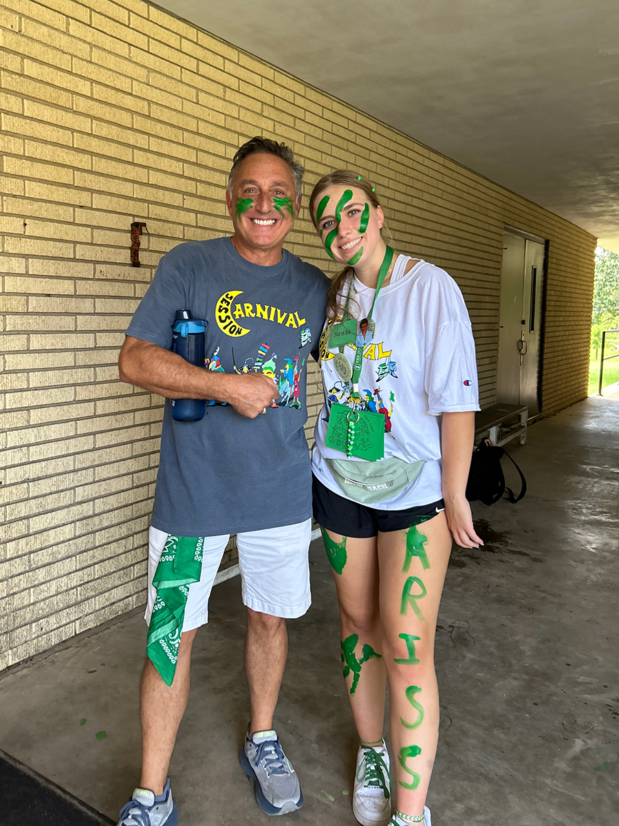 Man standing with woman.