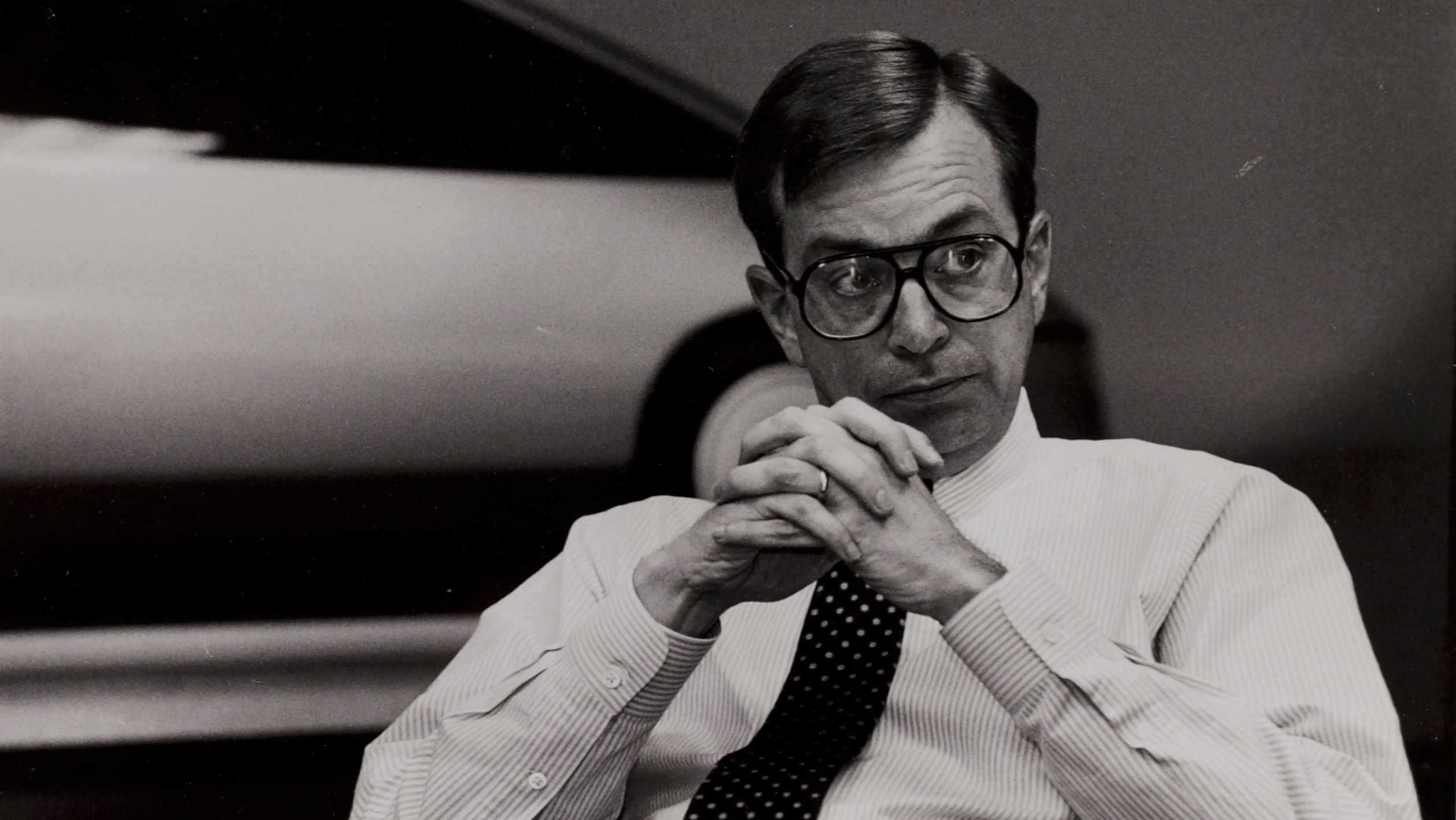 A man sitting in a chair.