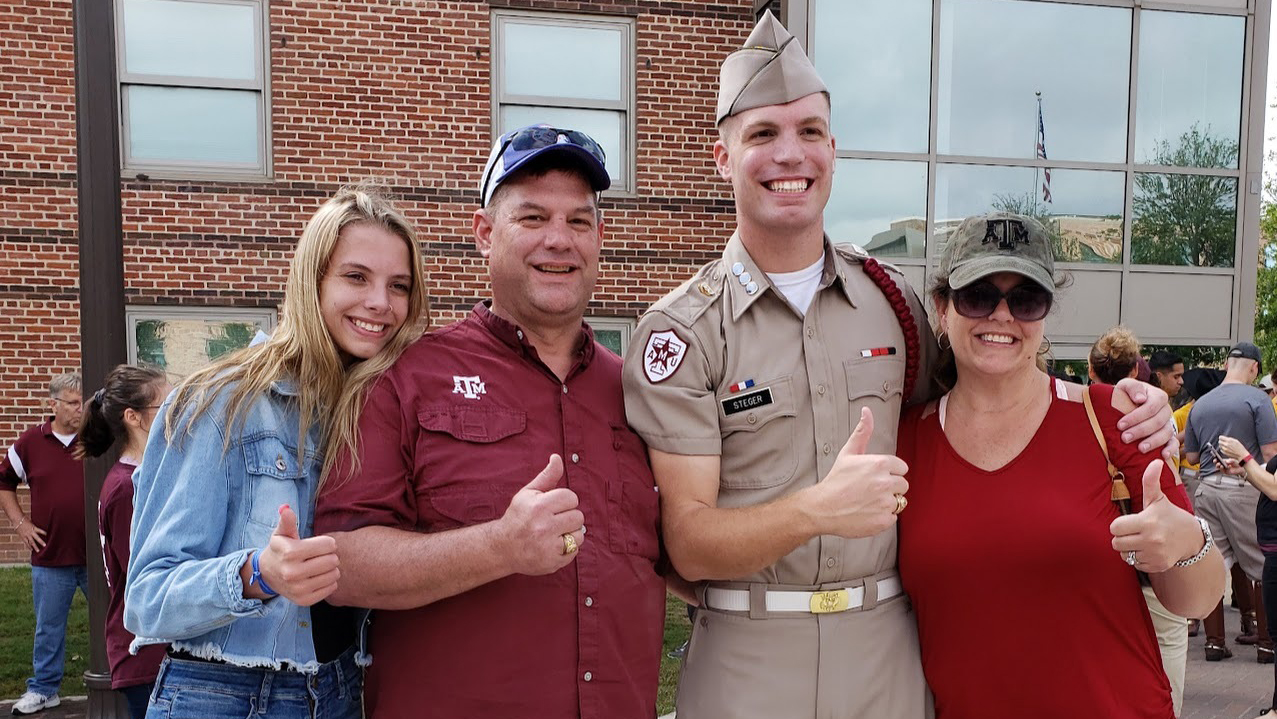 Family standing for photo.